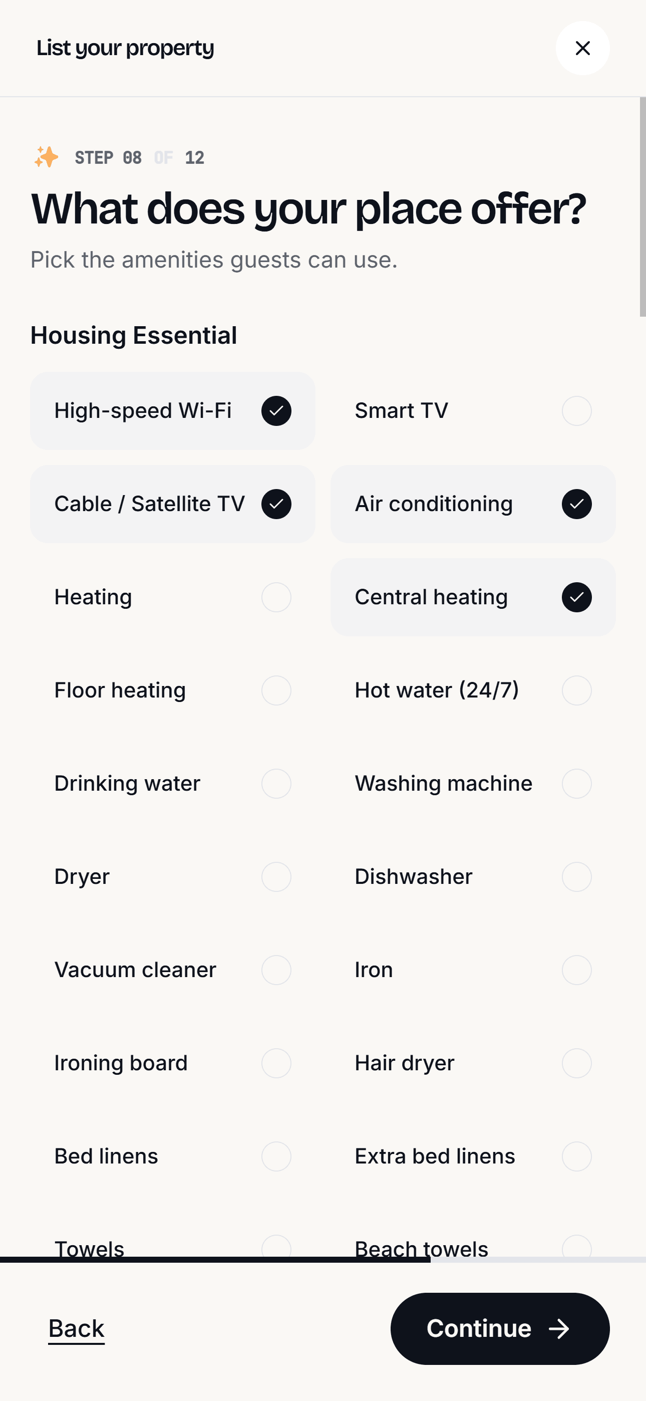 Listing wizard amenities screen with grouped checkboxes selected.